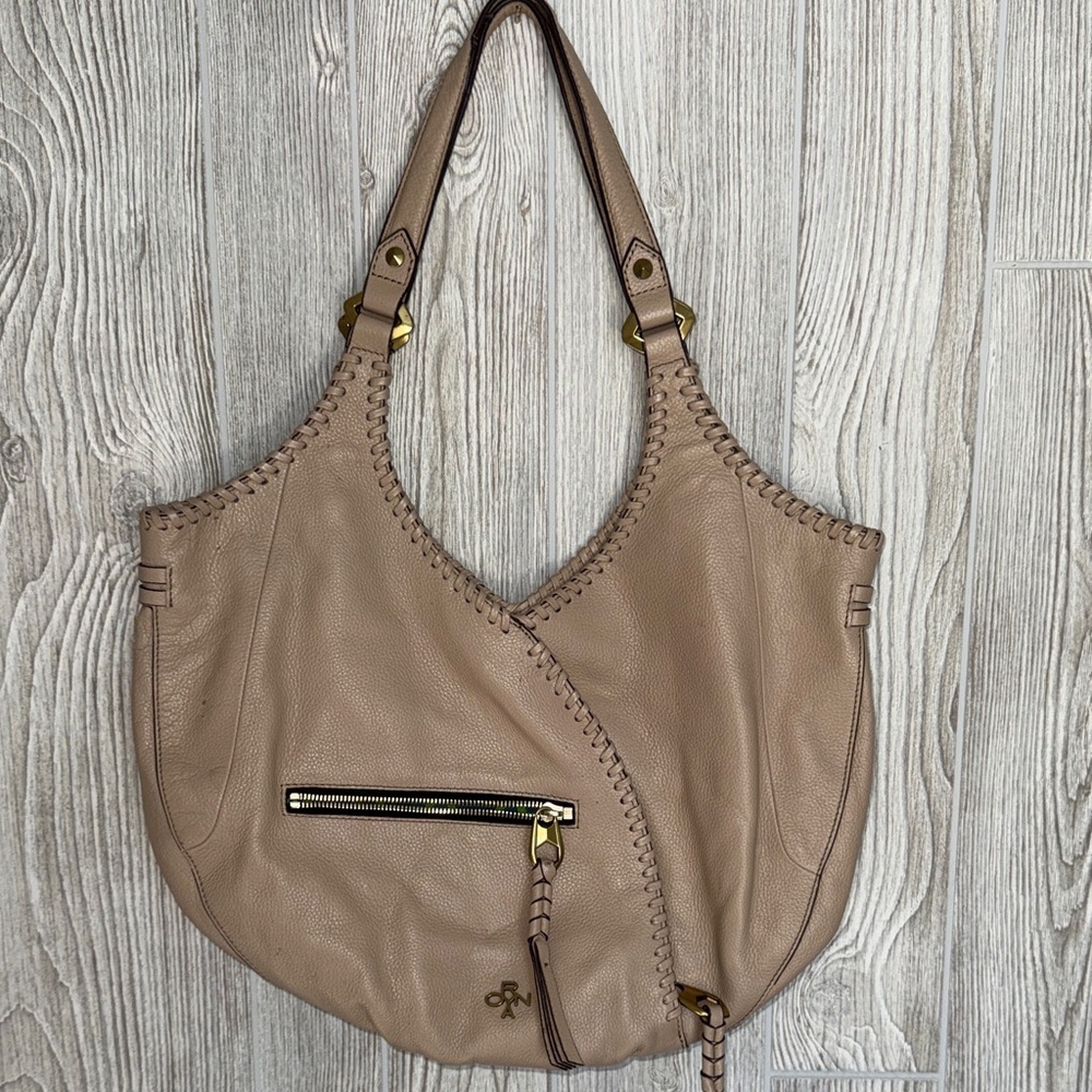 orYANY Taupe Leather Hobo Bag with Gold Details and whipstitching